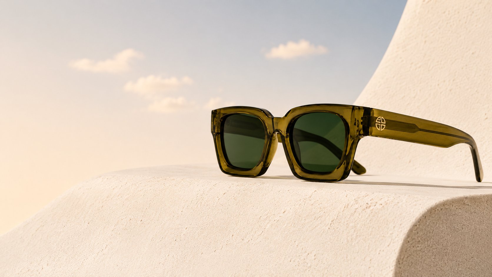 edit sunglasses on a sunlit coastal ledge